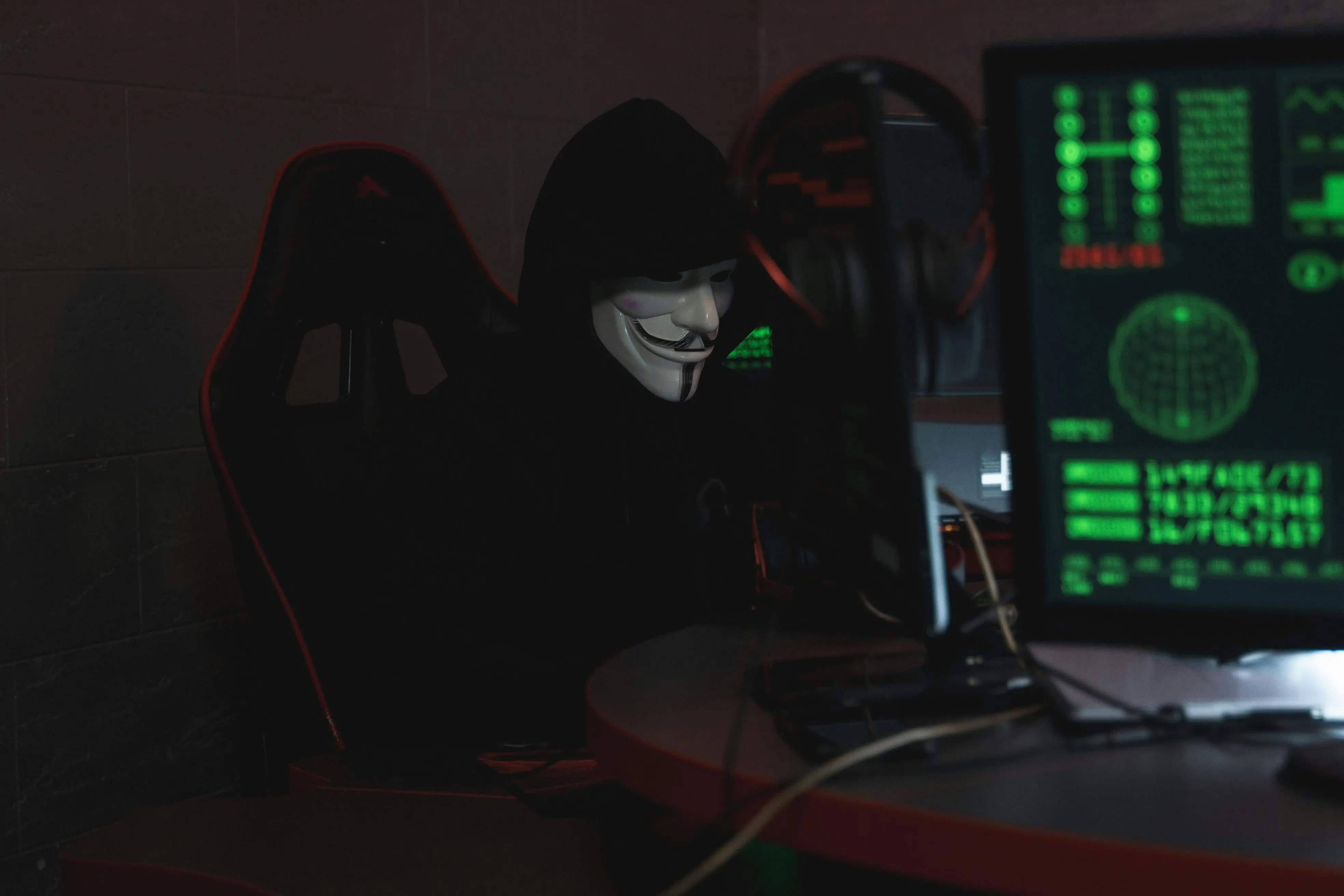 hacker in front of his computer